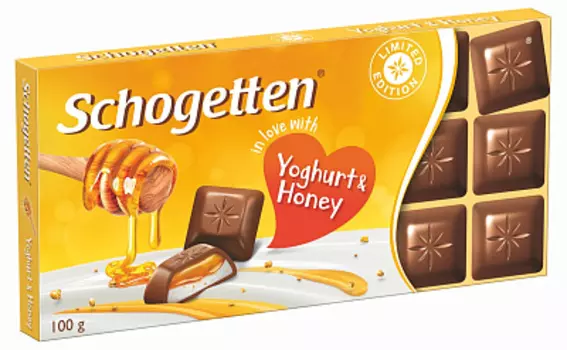 Шоколад молочный с начинкой из йогурта и гранулами меда SCHOGETTEN
