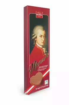 Шоколадные конфеты из молочного шоколада c начинкой из нуги из лесного ореха Mozart Confiserie Heindl