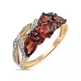 Золотое кольцо c бриллиантами и гранатами
