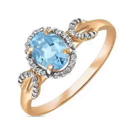 Золотое кольцо c топазом и фианитами