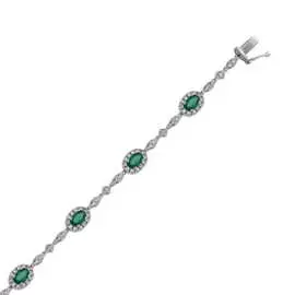 Золотой браслет c бриллиантами и изумрудами