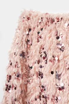 Юбка мини из трикотажа с перьями и пайетками