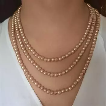 Estele gold pearl three layered necklace