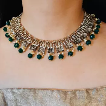Estele Gold Plated Antique Heavenly Thrishul & Damru Chocker Necklace Set with Green Beads for Women