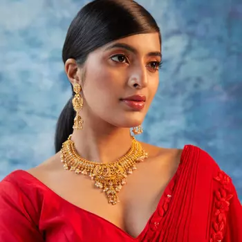 Estele Gold plated Divine Lakshmi Ji Temple Necklace set with color stones & Pearls