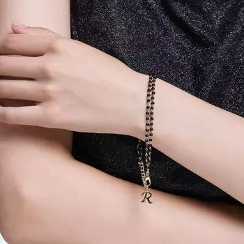 Estele Gold Plated Fascinating "R" Alphabet with Black Beads Bracelet for Women