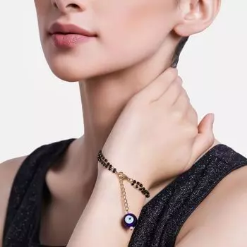 Estele Gold Plated Splendid Evil Eye Black Beads Bracelet for Women