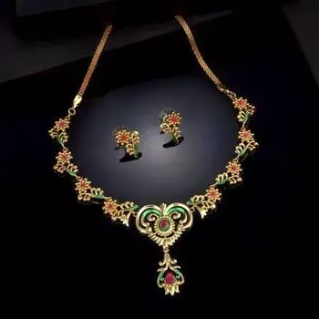 Estele Gold plated Traditional Peepal Necklace Set with Ruby & Enamel for Women
