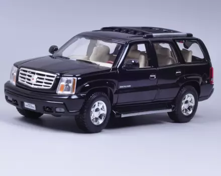 Модель автомобиля Cadillac Escalade в масштабе 1:24