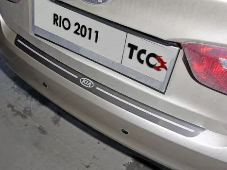 Накладка на задний бампер (лист шлифованный надпись RIO) Компания ТСС KIARIO11-12 KIA Rio III 2011 - 2014