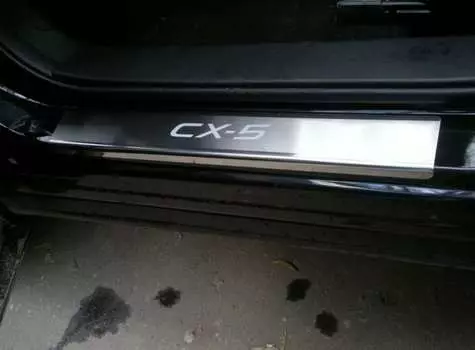 Накладки на внутренние пороги с надписью, нержавеющая сталь, 4 штуки Alu-Frost 08-1777 Mazda CX-5 (2G) 2017-