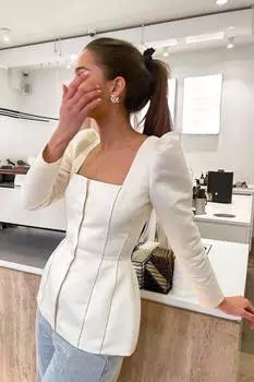 Топ из атласа с декором на рельефах