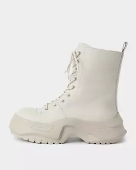 Ботинки из натуральной кожи на молнии на высокой непромокаемой подошве