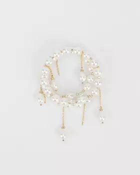 Браслет оригинальной формы с подвесками из каплевидного жемчуга и вставками из горного хрусталя