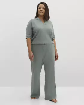 Брюки из эластичного трикотажа в рубчик с широким поясом