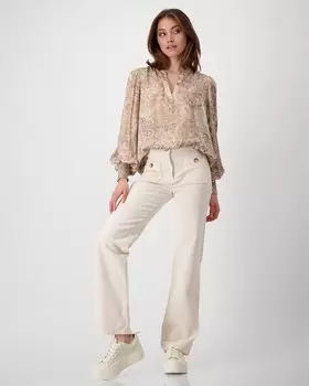 Брюки клеш от колена с накладными карманами спереди