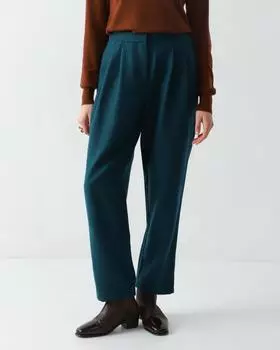 Шерстяные брюки, зауженные к низу, с резинкой по талии