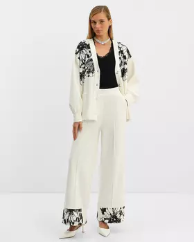 Широкие брюки из плотного трикотажа со стрелками и цветочным принтом