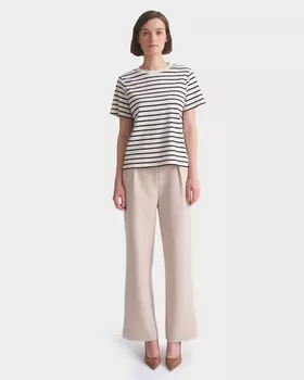 Брюки широкого кроя с боковыми карманами и защипами