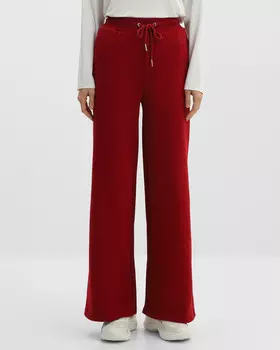 Брюки свободного кроя с эластичным поясом и боковыми карманами