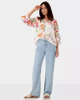 Брюки свободного кроя с завязывающимся поясом