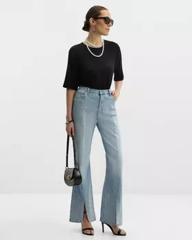 Джинсы клеш рельефного кроя со стразами по низу