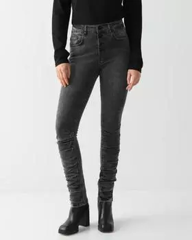 Джинсы облегающего кроя с декоративной сборкой по низу