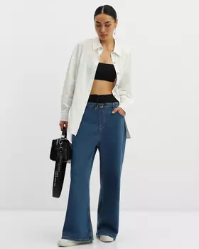 Джинсы свободного, расслабленного силуэта с контрастными вставками