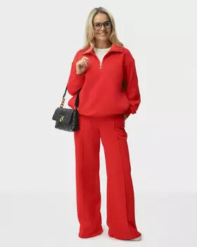 Хлопковые брюки с эластичным поясом, карманами на молнии и стрелками на штанинах