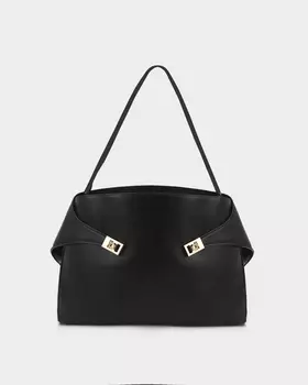 Вместительная сумка с декоративными замками