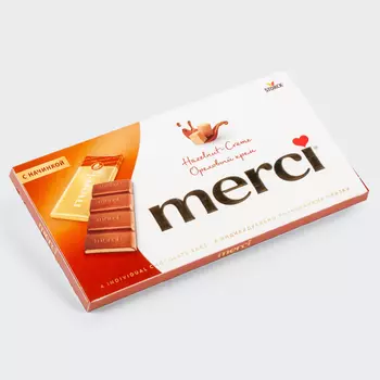 Молочный шоколад с ореховой начинкой merci