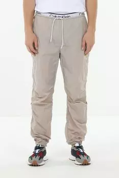 Брюки с эластичными манжетами CK Performance