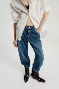 Джинсы с эффектом потертости Nume
