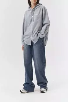 Джинсы с эффектом потертости свободного кроя Dunst