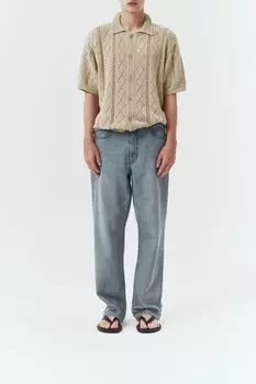 Джинсы с эффектом потертости свободного кроя Dunst