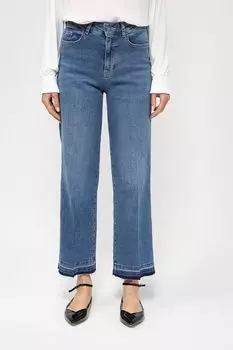 Джинсы с эффектом потертости свободного кроя More&More