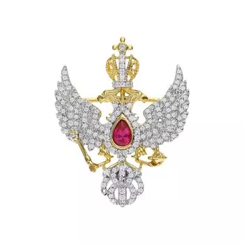 Серебряная брошь с фианитами и корундом