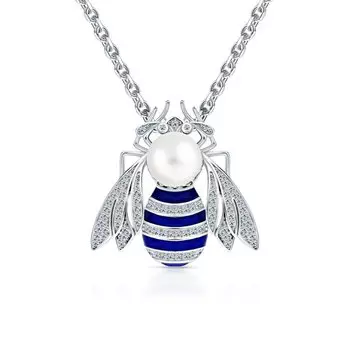 Серебряное шейное украшение с эмалью, жемчугом и фианитами