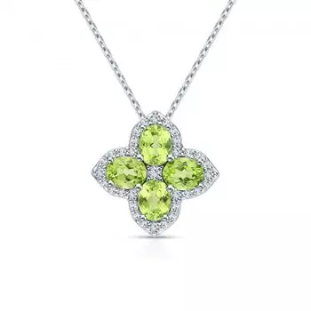 Серебряное шейное украшение с фианитами и хризолитом