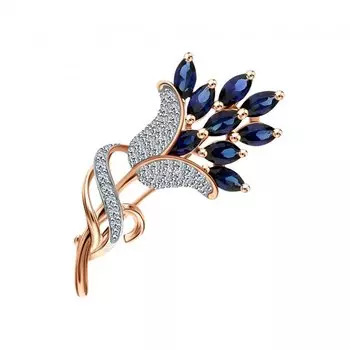 Золотая брошь с бриллиантами природными и сапфирами выращенными