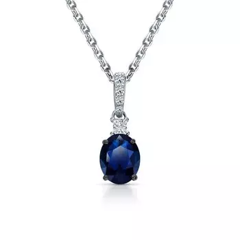 Золотая подвеска с сапфиром и бриллиантами