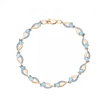 Золотой браслет с фианитами и топазами природными