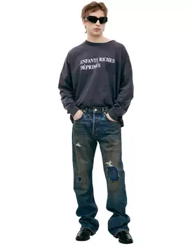 Blue jeans with mud effect