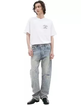 Рваные джинсы с потертостями