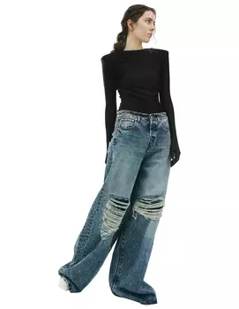 Широкие джинсы с рваными коленями