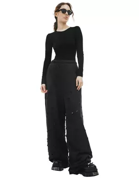 Широкие рваные брюки