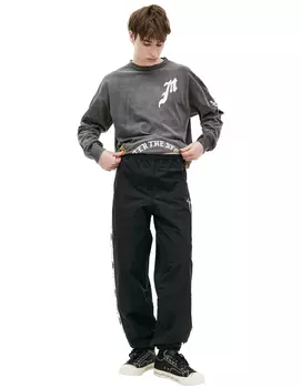 Side tape track trousers