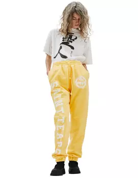 Желтые спортивные брюки