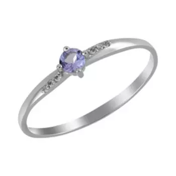 Платиновое кольцо с танзанитом и топазами