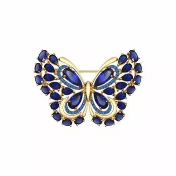 Золотая брошь с корундом